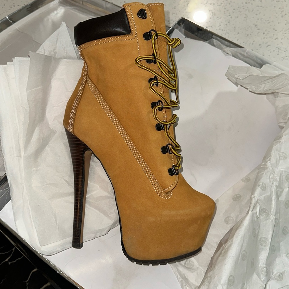 ZIGIgirl (“Timberland Heel Boots”) Size 7.5. Worn once. $150